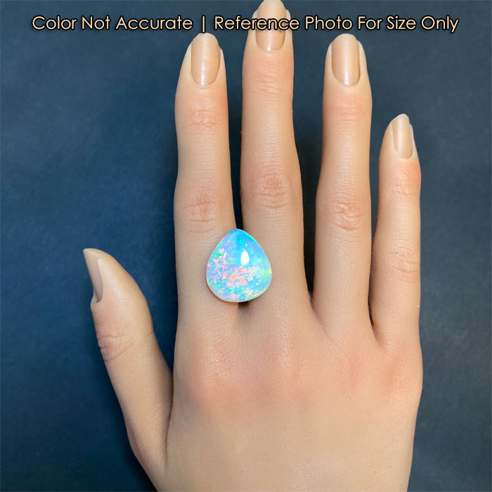pear shape opal on hand
