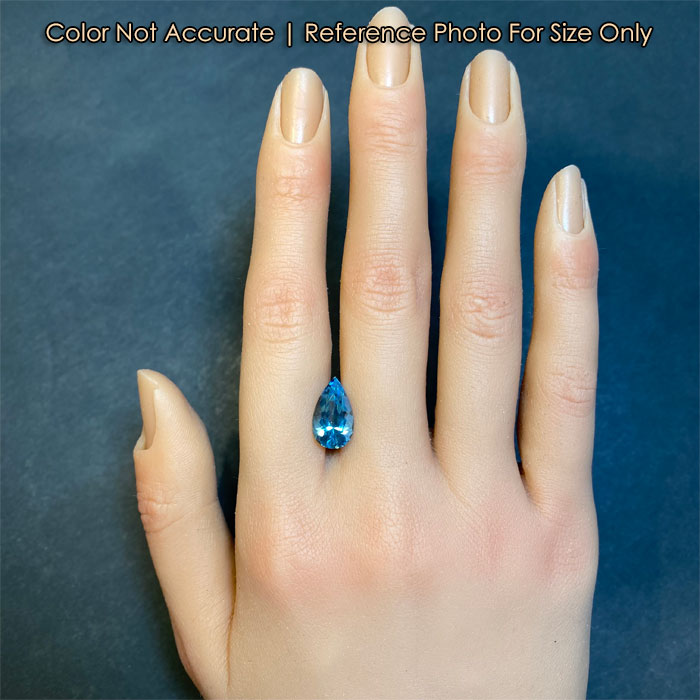 greenish blue pear shape aqua on hand size