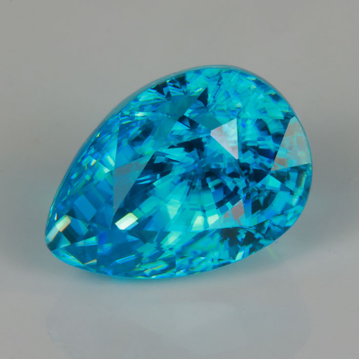 greenish blue pear shape brilliant cut zircon gemstone