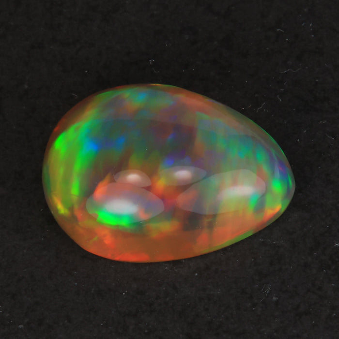 pear shape rainbow opal gem
