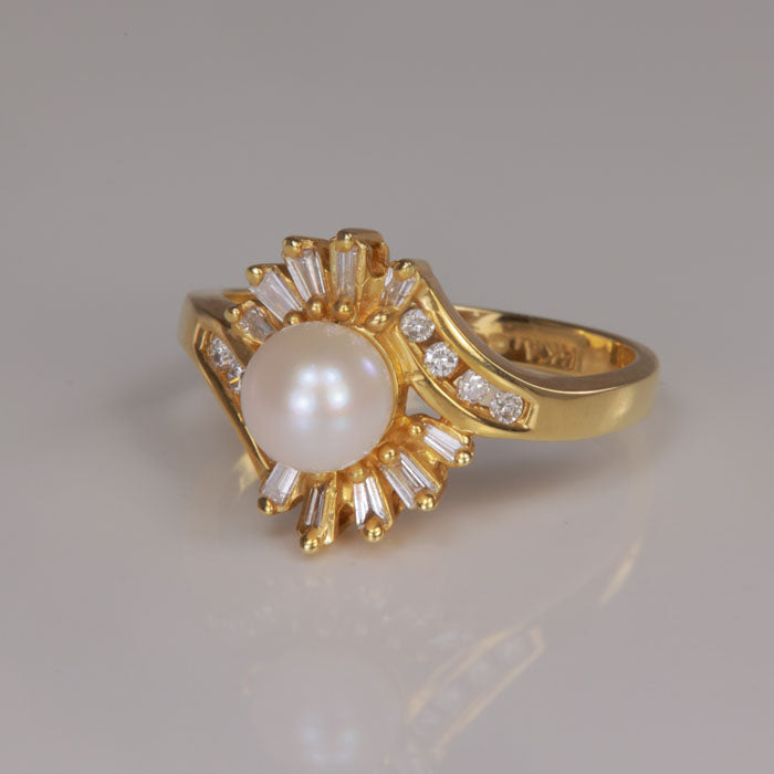 pearl and diamond ring in yellow gold