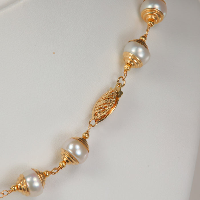 clasp on yellow gold pearl necklace