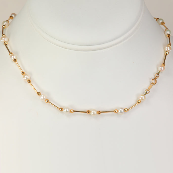 yellow gold pearl necklace with gold beads and tubes