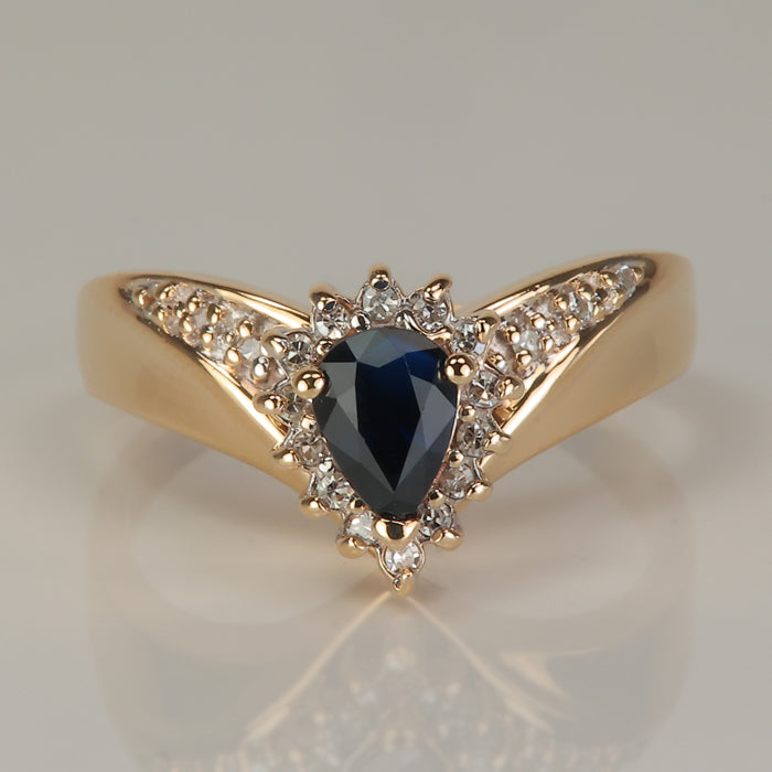 yellow gold pear shape sapphire and diamond ring