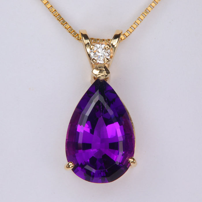 purple color pear shaped amethyst gemstone pendant with diamond accent