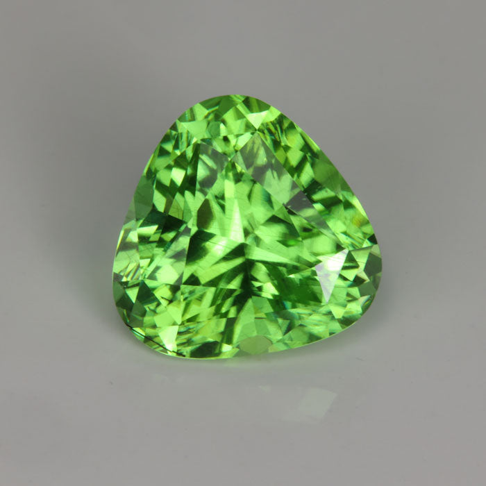 mint green peridot trilliant cut gem