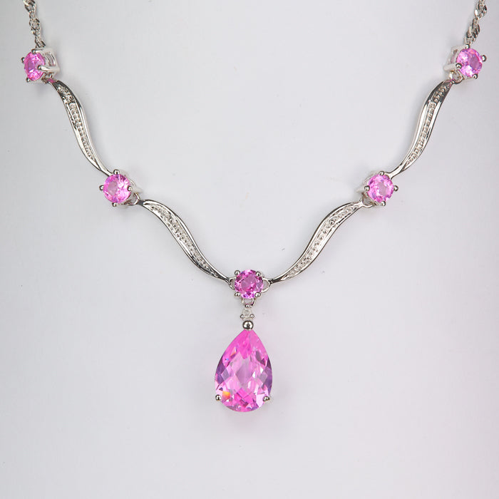 White gold lab pink sapphire and diamond necklace