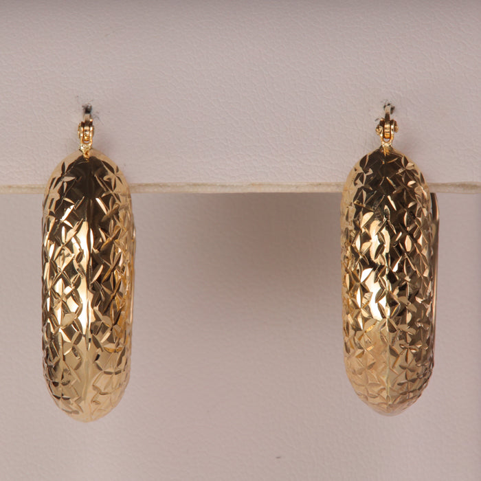 yellow gold diamond cut puffy hoop earrings