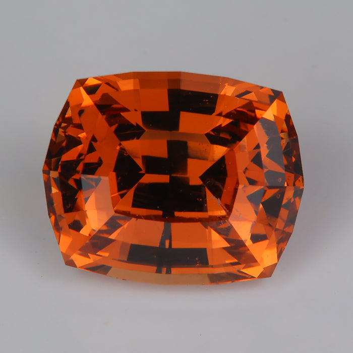reddish brown antique cushion garnet from tanzania
