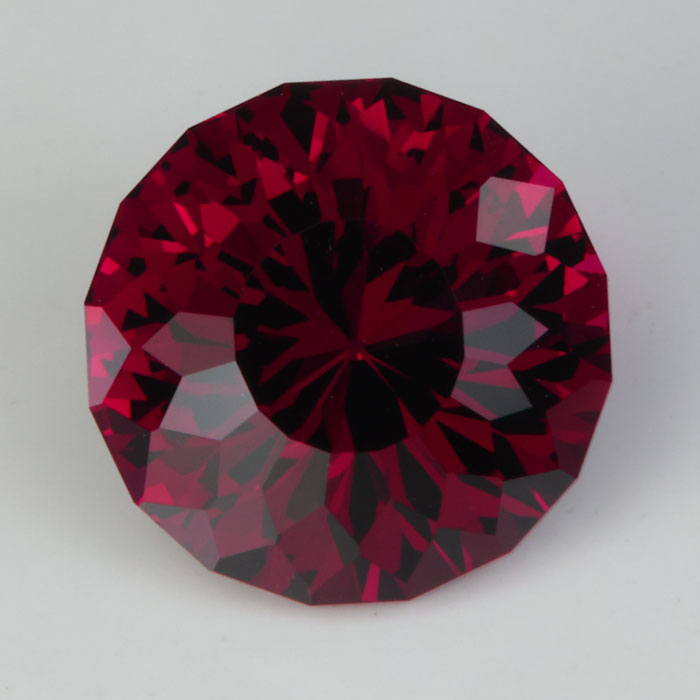 mixed round brilliant cut rhodolite garnet violet red color