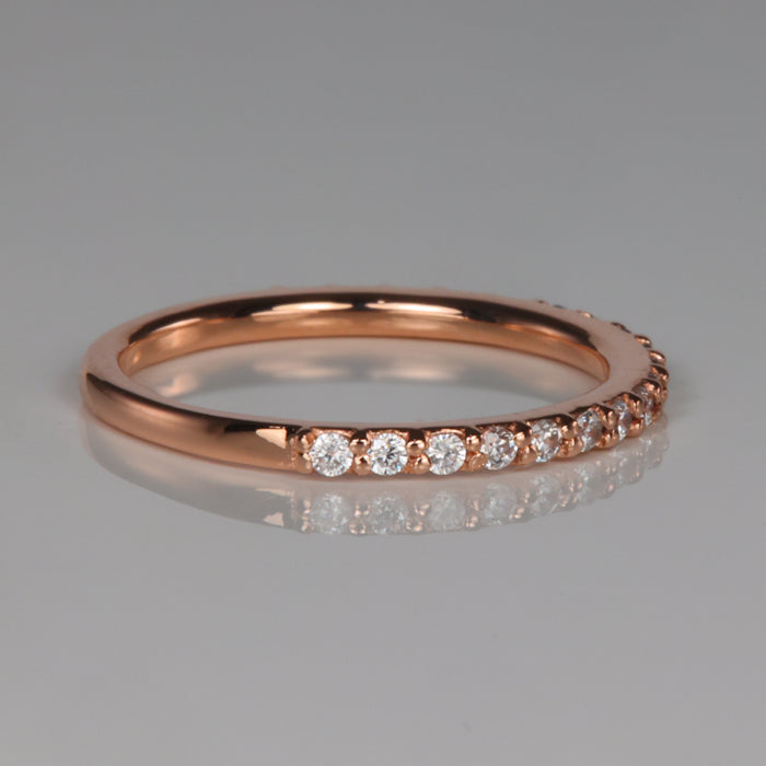 side of rose gold and cubic zirconia ring