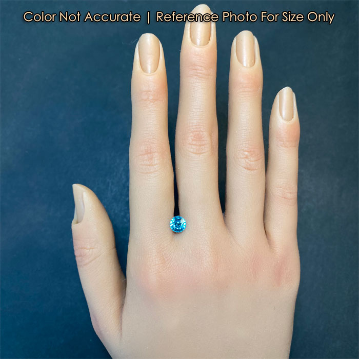 blue zircon gemstone size to a hand