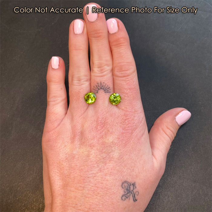 natural green round brilliant peridot pair size
