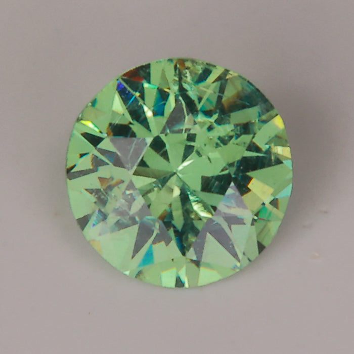 round brilliant blue green demantoid garnet gemstone 