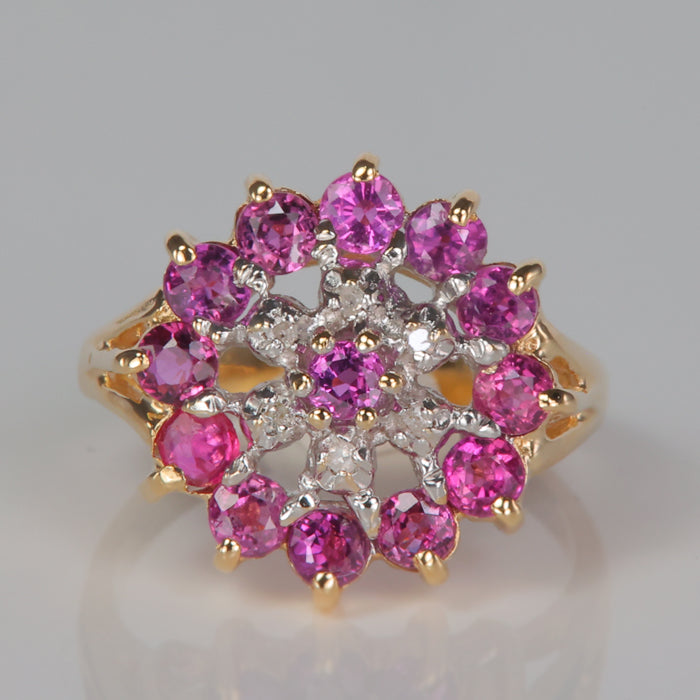 yellow gold ruby and diamond accent ring
