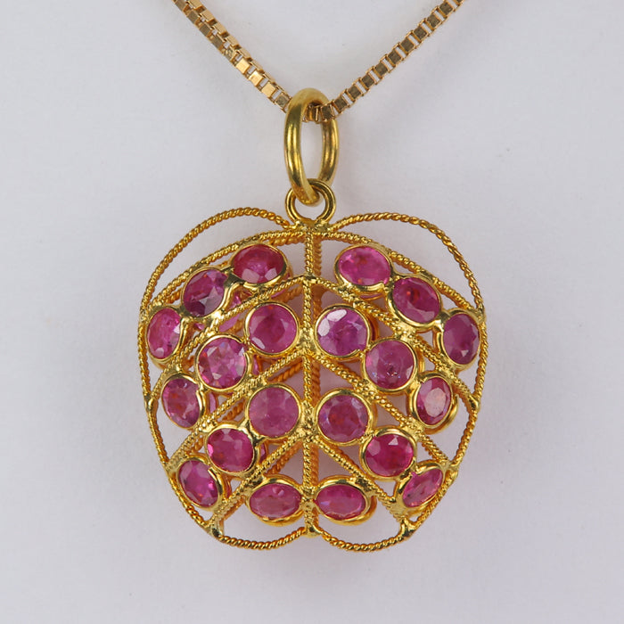 Yellow gold ruby apple shaped pendant