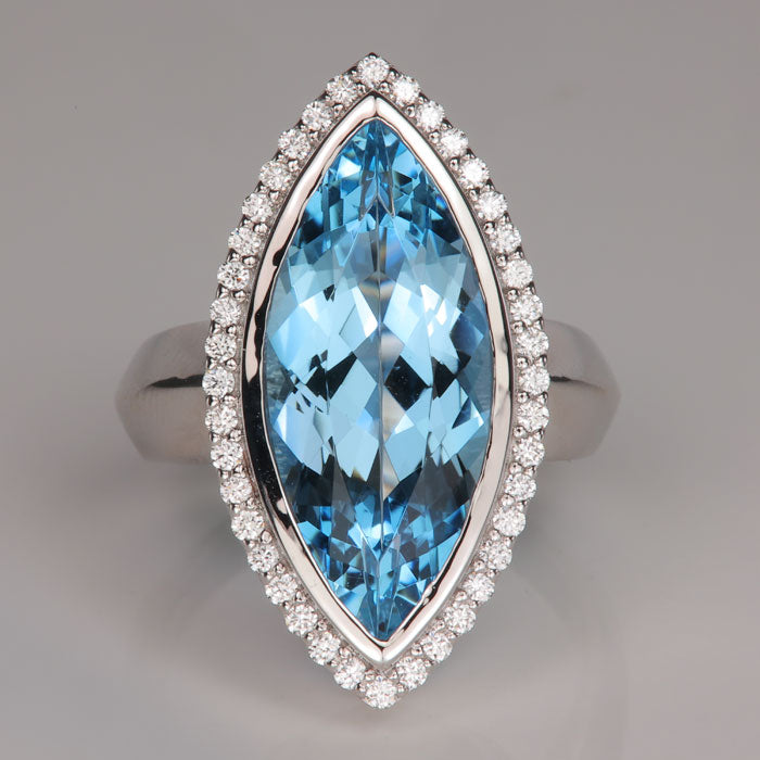 santa maria blue color aquamarine gemstone ring in platinum with diamond halo