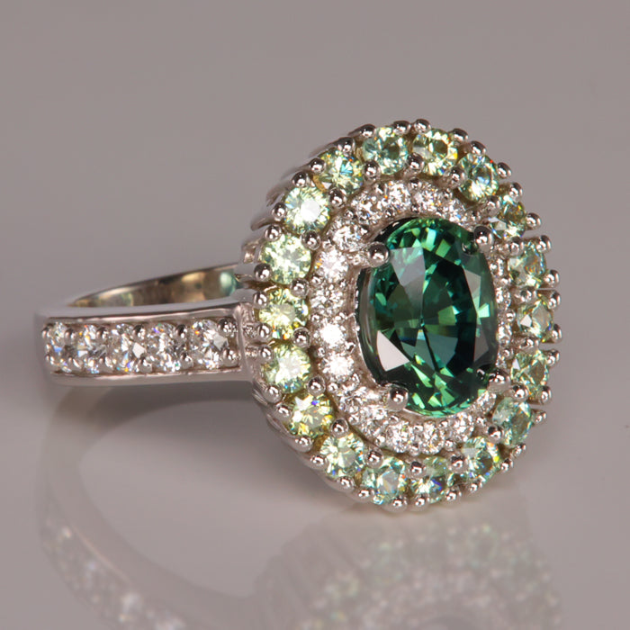 diamond and demantoid garnet accented ring with sapphire in white gold