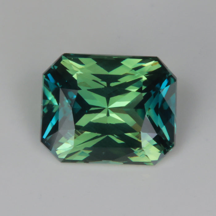 teal blue green color radiant emerald cut sapphire rare gemstone