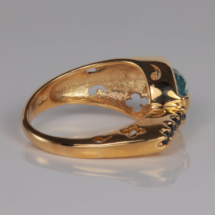 yellow gold gemstone ring with topaz and sapphire
