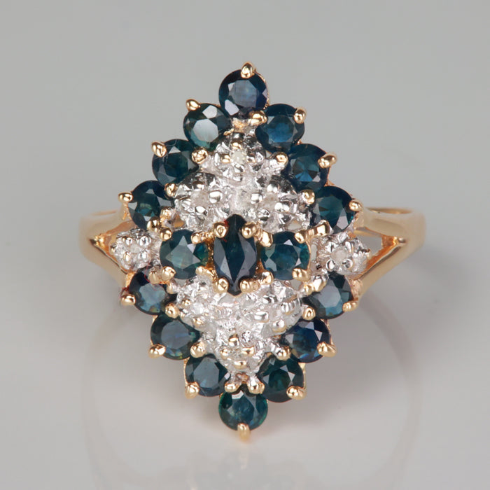 yellow gold estate ring with sapphire and diamonds 
