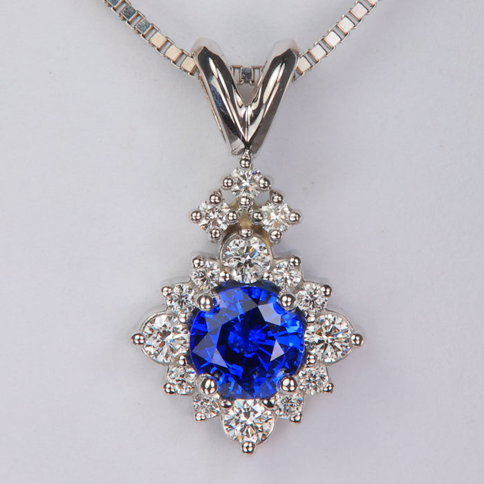 white gold blue sapphire gemstone pendant with diamonds