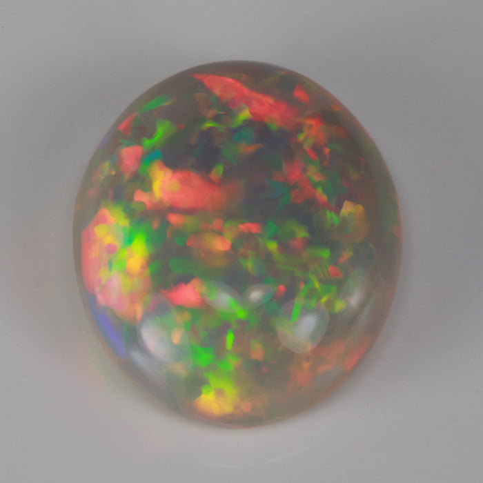 opal gemstone semi black oval cabochon