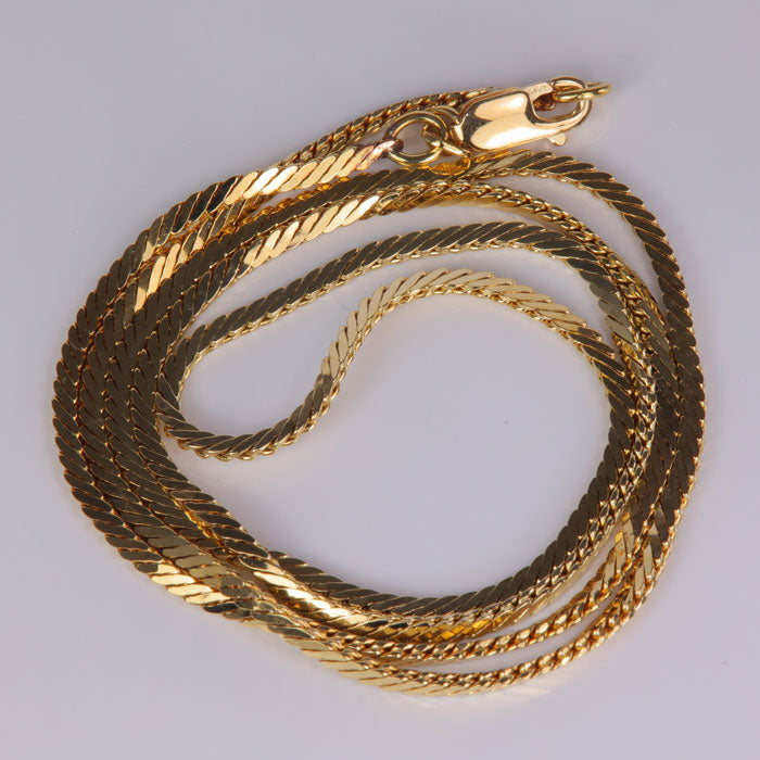 yellow gold chain with serpentine style links