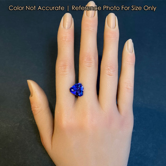 tanzanite gem on hand