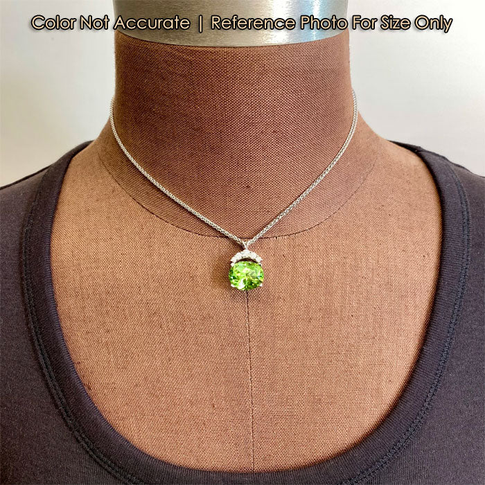 oval cut peridot gemstone and diamond pendant size reference
