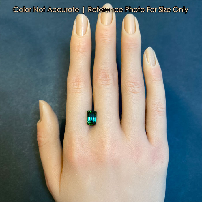 blue green tourmaline gem size on hand