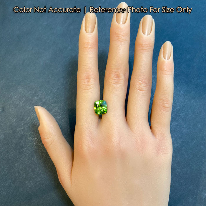 size of 4.88ct peridot gem on hand