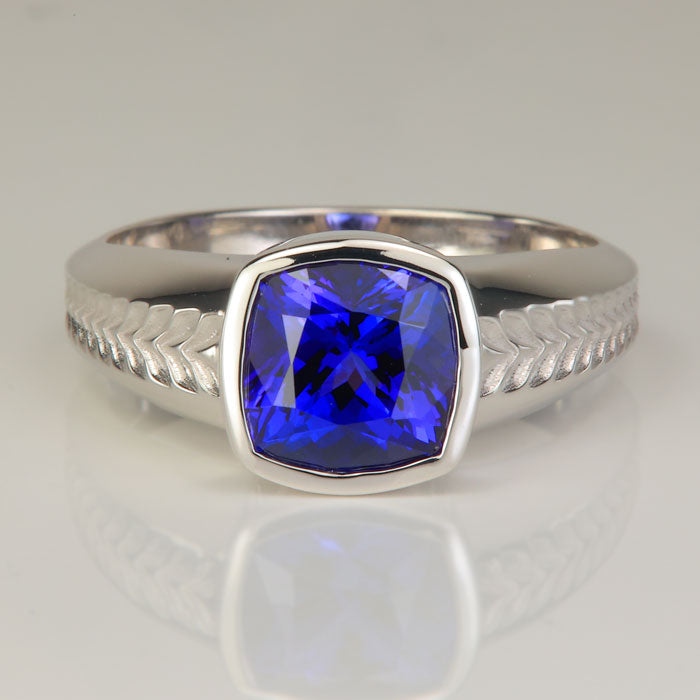 white gold square cushion cut tanzanite ring with millwork