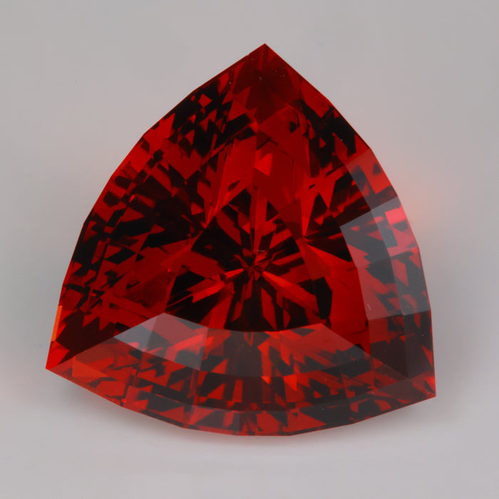 reddish orange citrine gemstone trilliant cut 