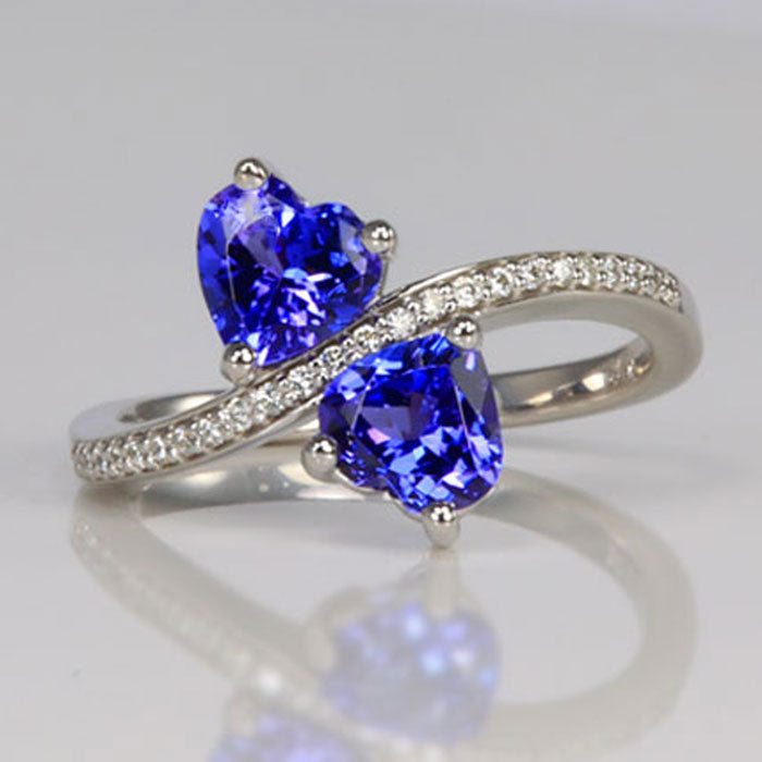 white gold blue violet tanzanite heart ring with diamonds