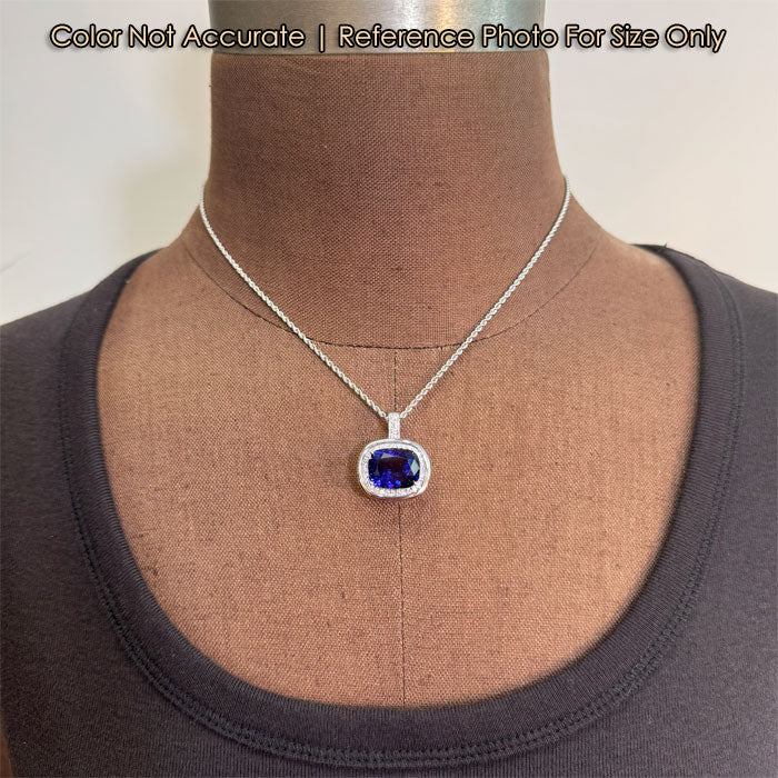 white gold tanzanite and diamond pendant