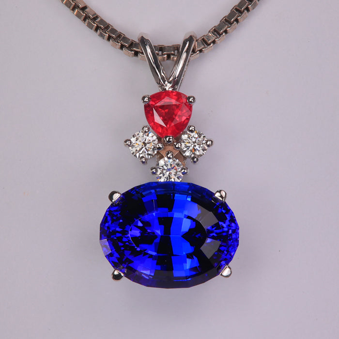 tanzanite gemstone pendant with ruby and diamond accents