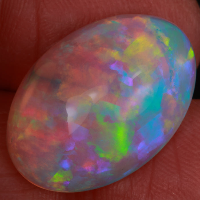 opal gem in hand top crystal clarity