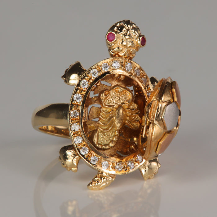 crawfish inside tricolor turtle ring with ruby eyes