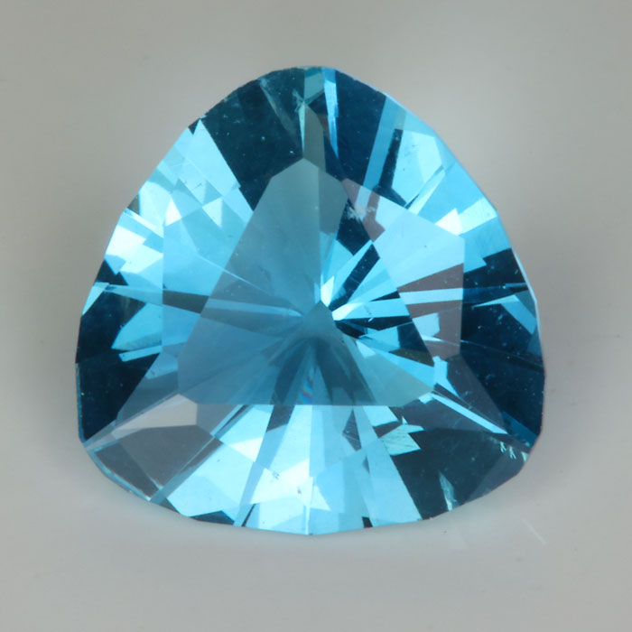 slightly greenish blue apatite gemstone trilliant cut 