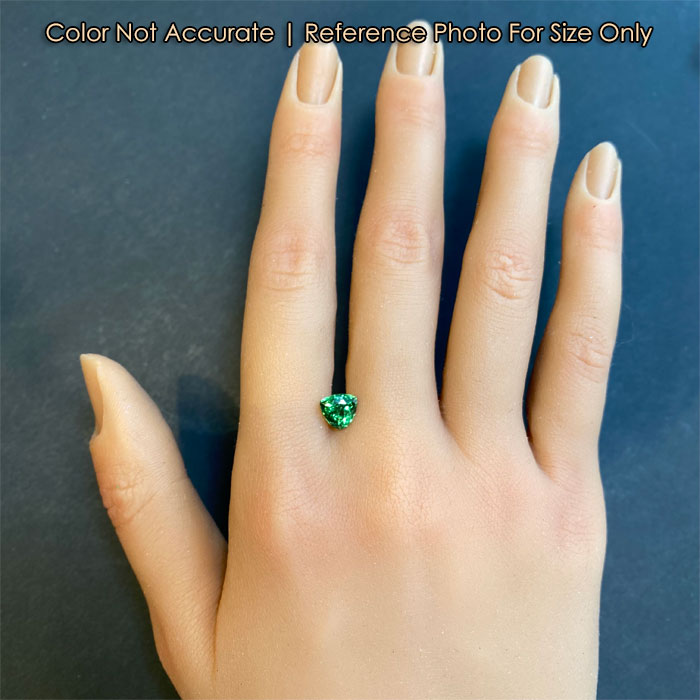 green color tourmaline on hand