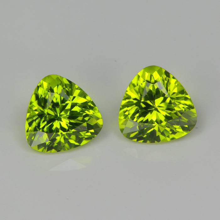green natural cut trilliant cut peridot gemstone pair