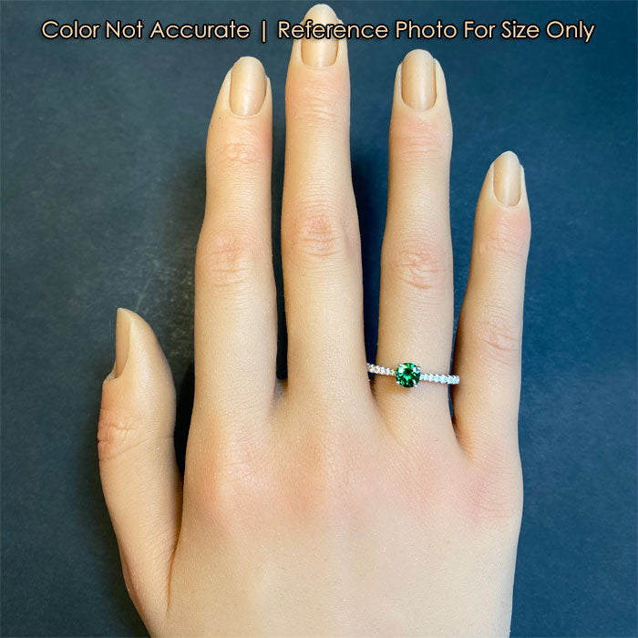 white gold tsavorite gem ring with diamonds