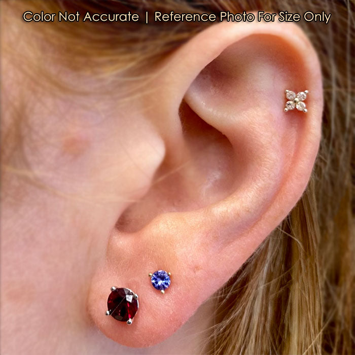 white gold and pyrope garnet studs