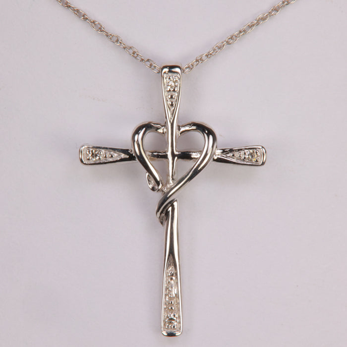 white gold and diamond pendant cross with heart on white gold chain
