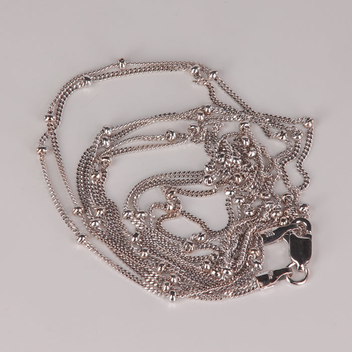 double saturn chain in white gold