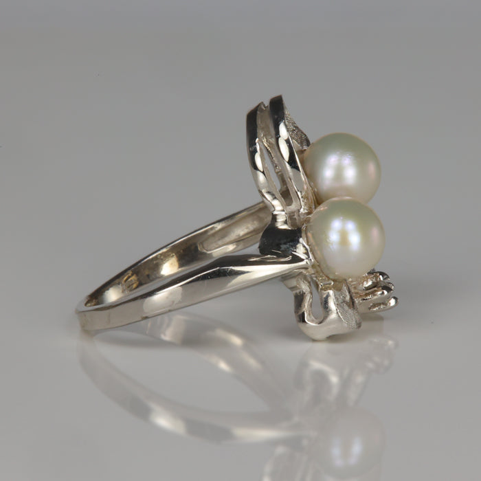 pearl and diamond accent ring in white gold