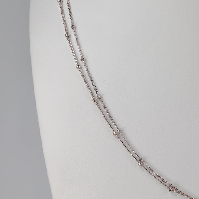 white gold bead chain saturn link double strand