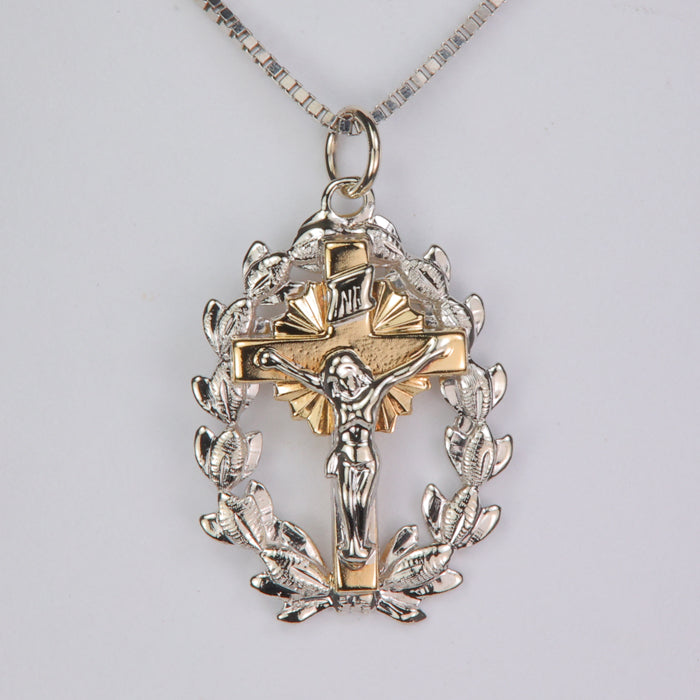 crucifix pendant in white and yellow gold 