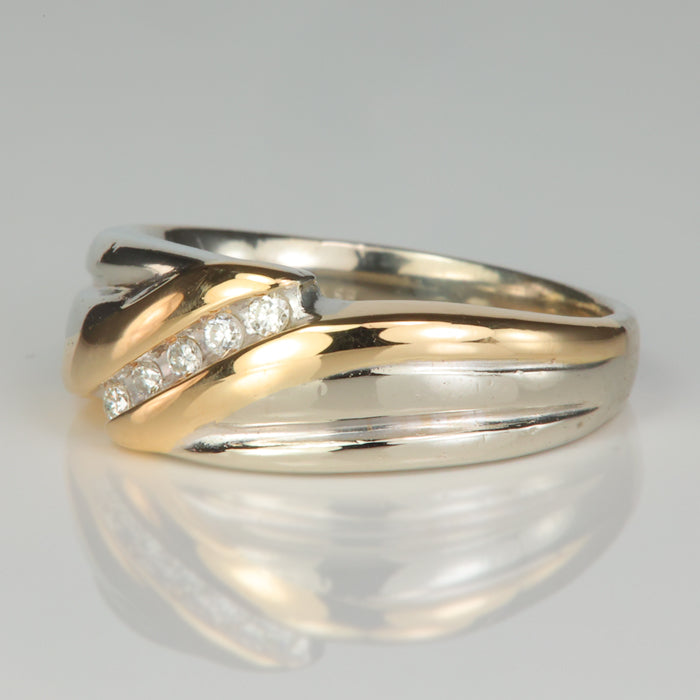 white and yellow gold estate ring with diamond accents
